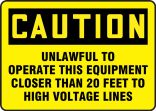 Safety Sign, Header: CAUTION, Legend: UNLAWFUL TO OPERATE THIS EQUIPMEMT WITHIN 10 FEET OF HIGH VOLTAGE LINES