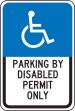 (FLORIDA) PARKING BY DISABLED PERMIT ONLY (W/HANDICAP SYMBOL)