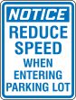 NOTICE REDUCE SPEED WHEN ENTERING PARKING LOT