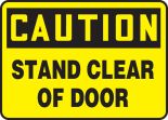 CAUTION STAND CLEAR OF DOOR
