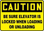 BE SURE ELEVATOR IS LOCKED WHEN LOADING OR UNLOADING