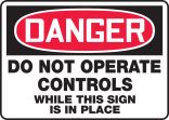 Do Not Operate Controls While This Sign Is In Place