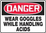 Safety Sign, Header: DANGER, Legend: WEAR GOGGLES WHILE HANDLING ACIDS
