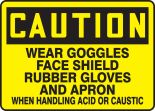 WEAR GOGGLES FACE SHIELD RUBBER GLOVES AND APRON WHEN HANDLING ACID OR CAUSTIC