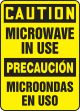 MICROWAVE IN USE (BILINGUAL)