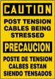 Safety Sign, Header: CAUTION, Legend: POST TENSION CABLES BEING STRESSED