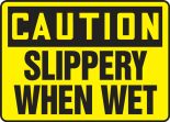 Safety Sign, Header: CAUTION, Legend: SLIPPERY WHEN WET