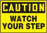 Safety Sign, Header: CAUTION, Legend: CAUTION WATCH YOUR STEP