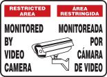 Safety Sign, Header: RESTRICTED AREA/AREA RESTRINGIDA, Legend: MONITORED BY VIDEO CAMERA (W/GRAPHIC)(BILINGUAL)