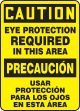 CAUTION EYE PROTECTION REQUIRED IN THIS AREA (BILINGUAL - SPANISH)