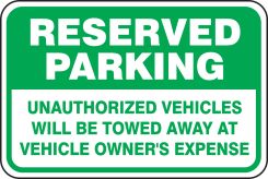Reserved Parking Traffic Sign: Unauthorized Vehicles Will Be Towed Away At Vehicle Owner's Expense