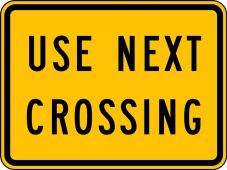 Rail Sign: Use Next Crossing
