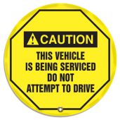 ANSI Caution Steering Wheel Message Cover: This Vehicle Is Being Serviced Do Not Attempt To Drive