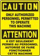 CAUTION ONLY AUTHORIZED PERSONNEL PERMITTED TO OPERATE THIS MACHINE (BILINGUAL)