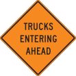 TRUCKS ENTERING AHEAD