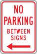 NO PARKING BETWEEN SIGNS <----