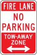 FIRE LANE NO PARKING TOW-AWAY ZONE <---->