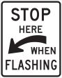 STOP HERE WHEN FLASHING (CURVED ARROW DOWN LEFT)