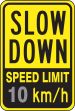 SLOW DOWN SPEED LIMIT ___ KM/H