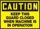 KEEP THIS GUARD CLOSED WHEN MACHINE IS IN OPERATION