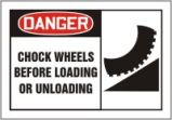 CHOCK WHEELS BEFORE LOADING OR UNLOADING (W/GRAPHIC)