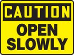 OPEN SLOWLY