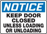 KEEP DOOR CLOSED UNLESS LOADING OR UNLOADING
