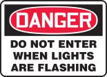 DO NOT ENTER WHEN LIGHTS ARE FLASHING
