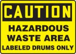 HAZARDOUS WASTE AREA LABELED DRUMS ONLY