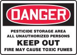 PESTICIDE STORAGE AREA ALL UNAUTHORIZED PERSONS KEEP OUT FIRE MAY CAUSE TOXIC FUMES