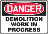 Safety Sign, Header: DANGER, Legend: DEMOLITION WORK IN PROGRESS