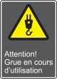 ATTENTION! GRUE EN COURS D'UTILISATION