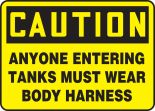 ANYONE ENTERING TANKS MUST WEAR BODY HARNESS