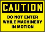 DO NOT ENTER WHILE MACHINERY IN MOTION