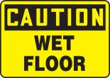 Safety Sign, Header: CAUTION, Legend: WET FLOOR
