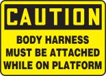 BODY HARNESS MUST BE ATTACHED WHILE ON PLATFORM