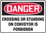 CROSSING OR STANDING ON CONVEYOR IS FORBIDDEN