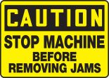 STOP MACHINE BEFORE REMOVING JAMS