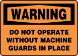 DO NOT OPERATE WITHOUT MACHINE GUARDS IN PLACE