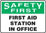 Safety Sign, Header: SAFETY FIRST, Legend: FIRST AID STATION IN OFFICE