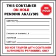 THIS CONTAINER ON HOLD PENDING ANALYSIS ...