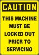 THIS MACHINE MUST BE LOCKED OUT PRIOR TO SERVICING