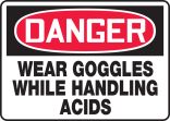 WEAR GOGGLES WHILE HANDLING ACIDS