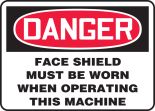 FACE SHIELD MUST BE WORN WHEN OPERATING THIS MACHINE
