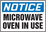 MICROWAVE OVEN IN USE