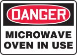 MICROWAVE OVEN IN USE
