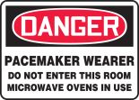 PACEMAKER WEARER DO NOT ENTER THIS ROOM MICROWAVE OVENS IN USE