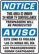 THIS AREA IS UNDER 24 HOUR SURVEILLANCE TRESPASSERS WILL BE PROSECUTED (BILINGUAL)