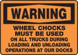 WHEEL CHOCKS MUST BE USED ON ALL TRUCKS DURING LOADING AND UNLOADING OPERATIONS AT OUR DOCKS