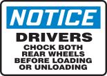 DRIVERS CHOCK BOTH REAR WHEELS BEFORE LOADING OR UNLOADING